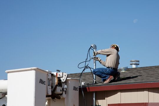technician on roof