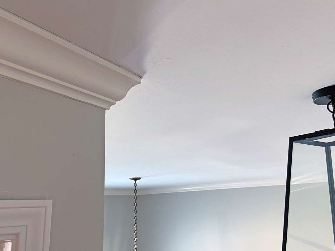 ceiling in a residential home with crown molding