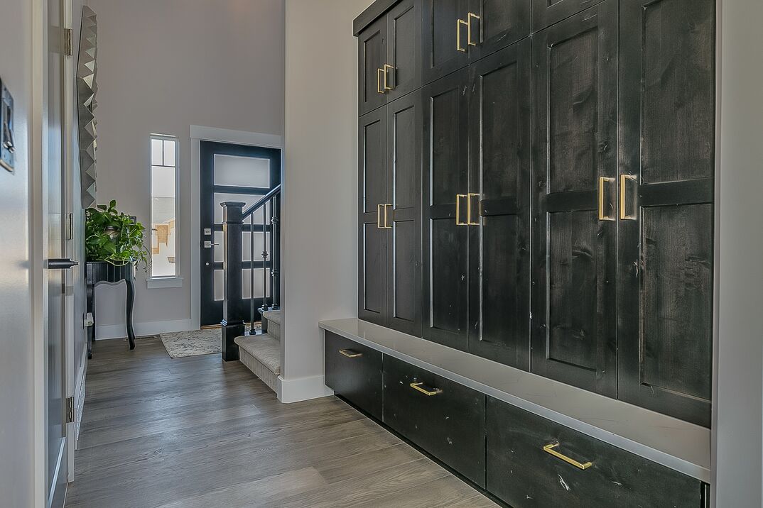 a modern and elegant mud room in a luxury home 