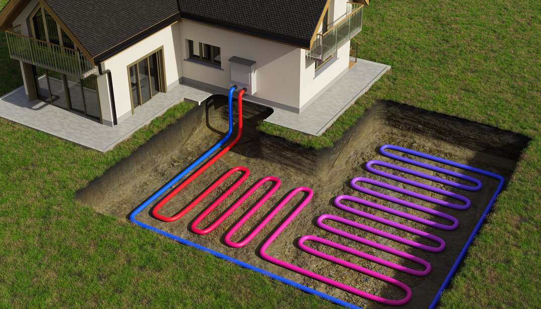 A geothermal heat pump system is depicted in a photo illustration showing a white house with a dark colored pointed roof sitting on a concrete slab and next to it a cutout view of the underground of a grassy yard with blue and red piping coils demonstrating how heat and coolness are transferred from the earth to the home, geothermal heat pump, geothermal, heat pump, climate control, heating, cooling, HVAC, heating ventilation and air conditioning, coils, heater, AC, air conditioning, air conditioner, house, home, grass, lawn, green grass, yard, underground, dugout, photo illustration