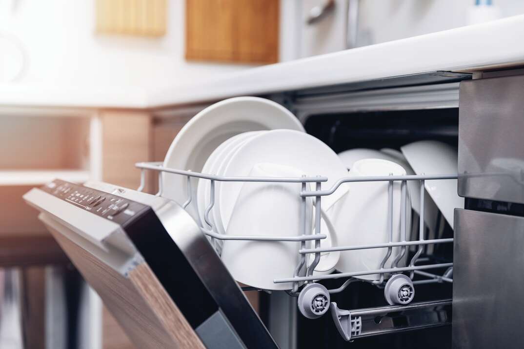 dishes in an open dishwasher