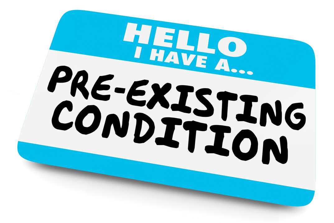 A photo illustration shows a blue and white name tag that states Hello I Have a Pre Existing Condition positioned against a white background, name tag, pre-existing condition, condition, health coverage, health insurance, coverage, medical coverage, medical, insurance, healthcare, health care, health insurance