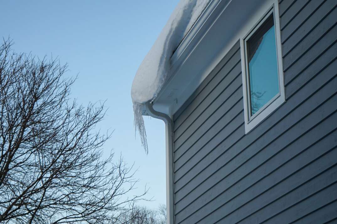 gutters covered in ice and snow