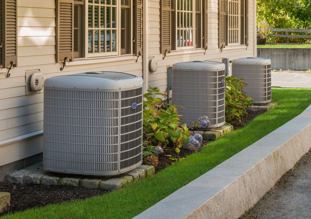 Three outdoor central AC units