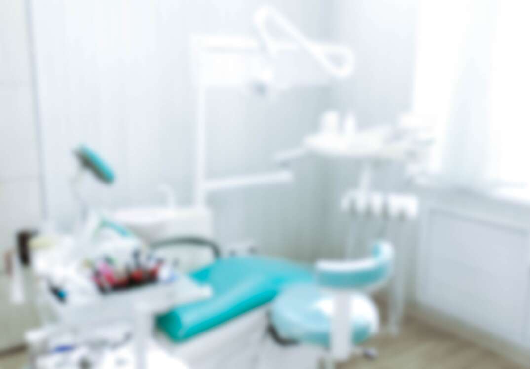 Blurred image of the dentist office, medical background. Dentist cabinet.