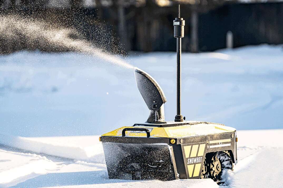 robot snowblower blows snow