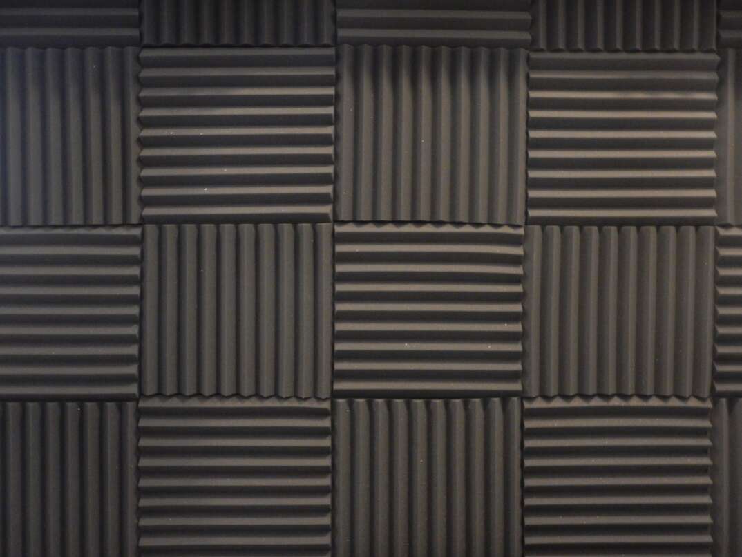 Acoustical foam or tiles for sound dampening. Music room. Soundproof room. Low key photo.