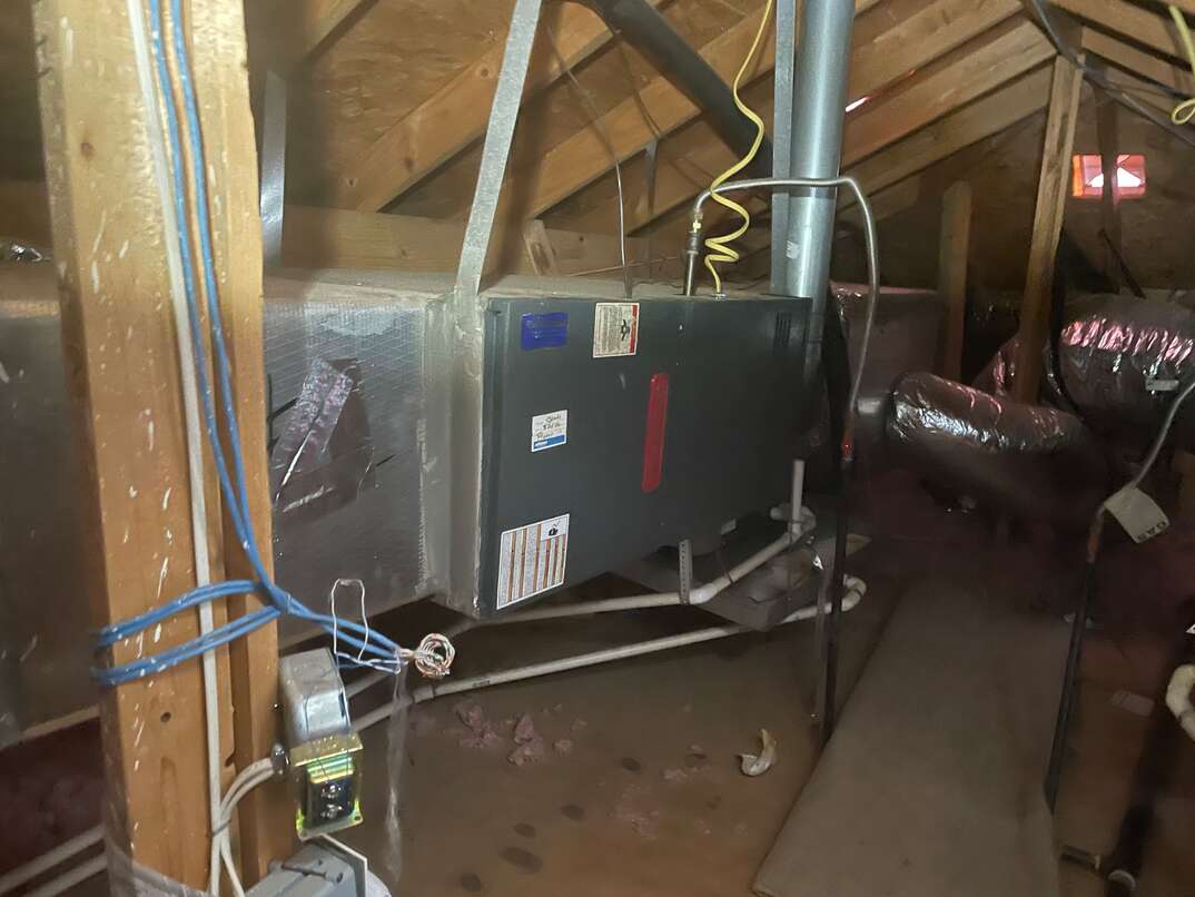 HVAC system in customer attic