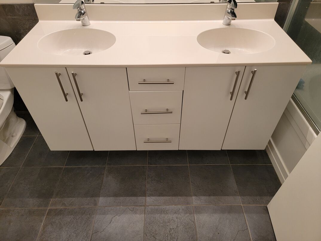 white bathroom vanity with double sink