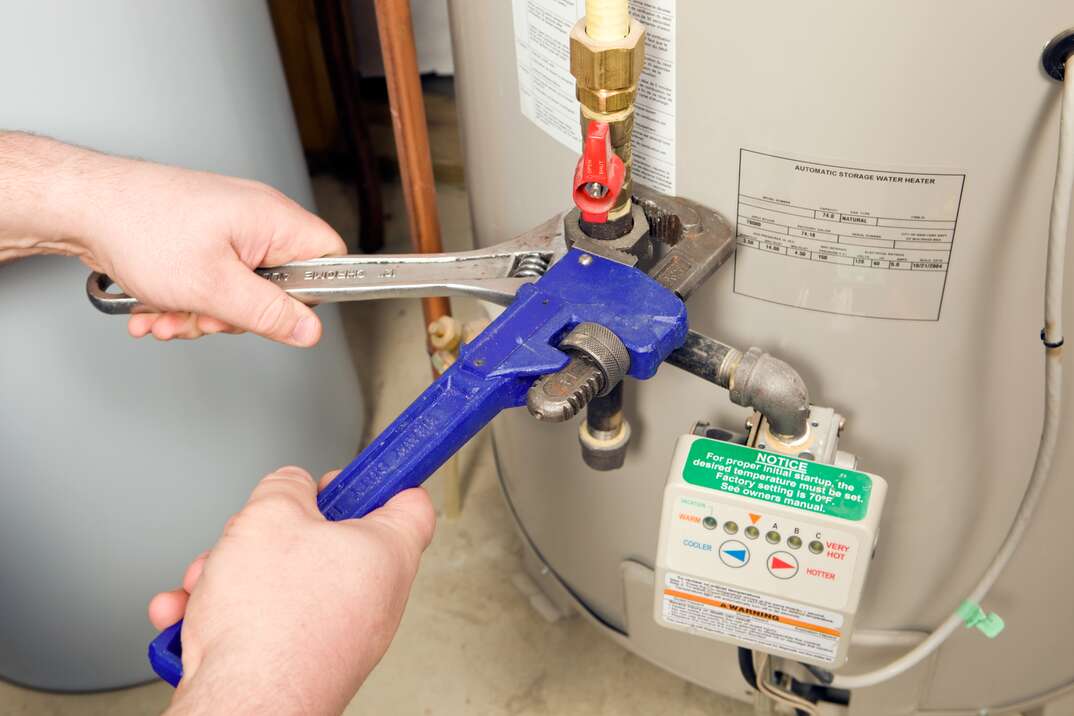 fixing water heater double wrenches