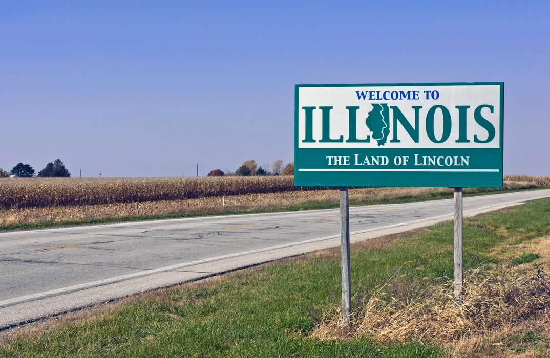 Welcome to Illinois sign on the side of a road