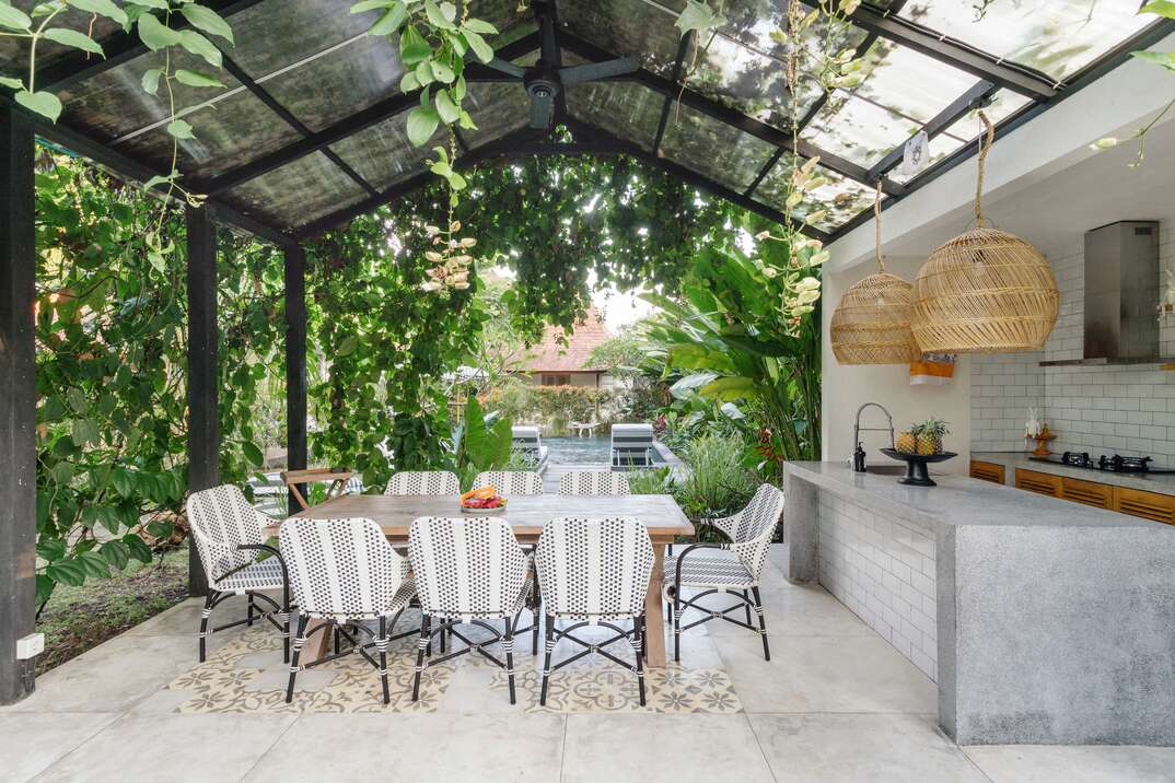 Dining room table and chairs on open kitchen