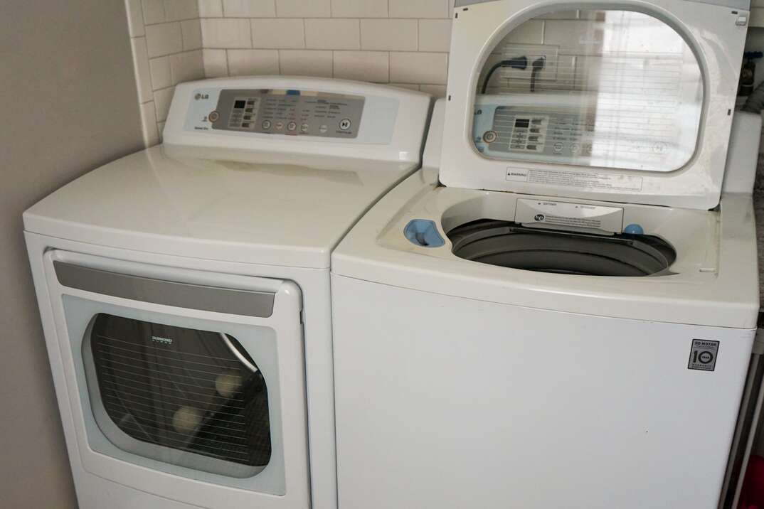 residential washer and dryer in laundry room