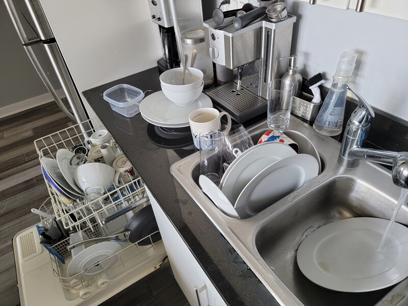 Rinsing dishes in a double sink