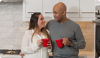 A happy couple in the kitchen