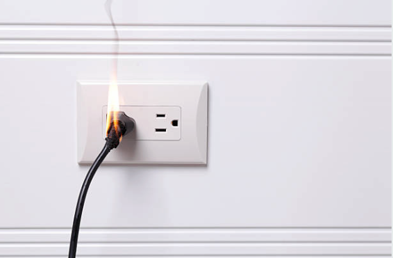 burning electrical socket and plug