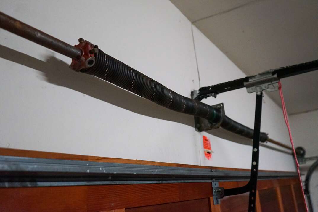 How Much Does It Cost To Repair Or Replace A Garage Door Spring 