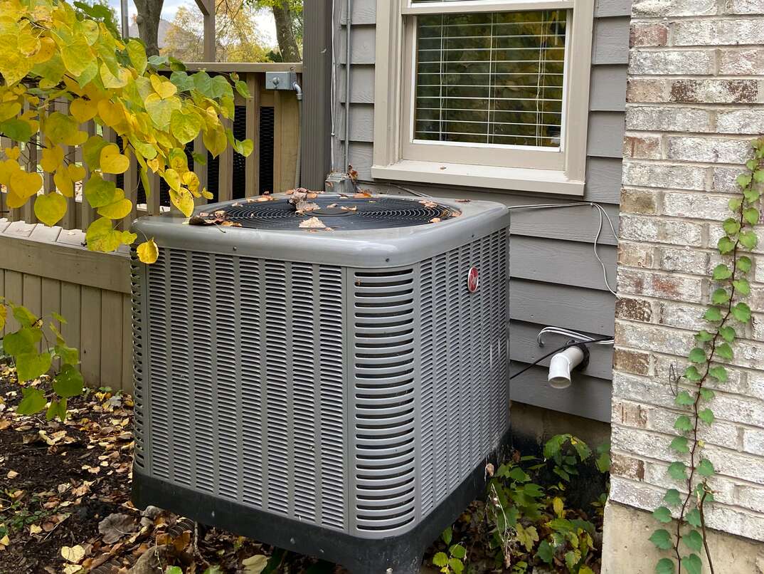 uncovered AC unit in the winter