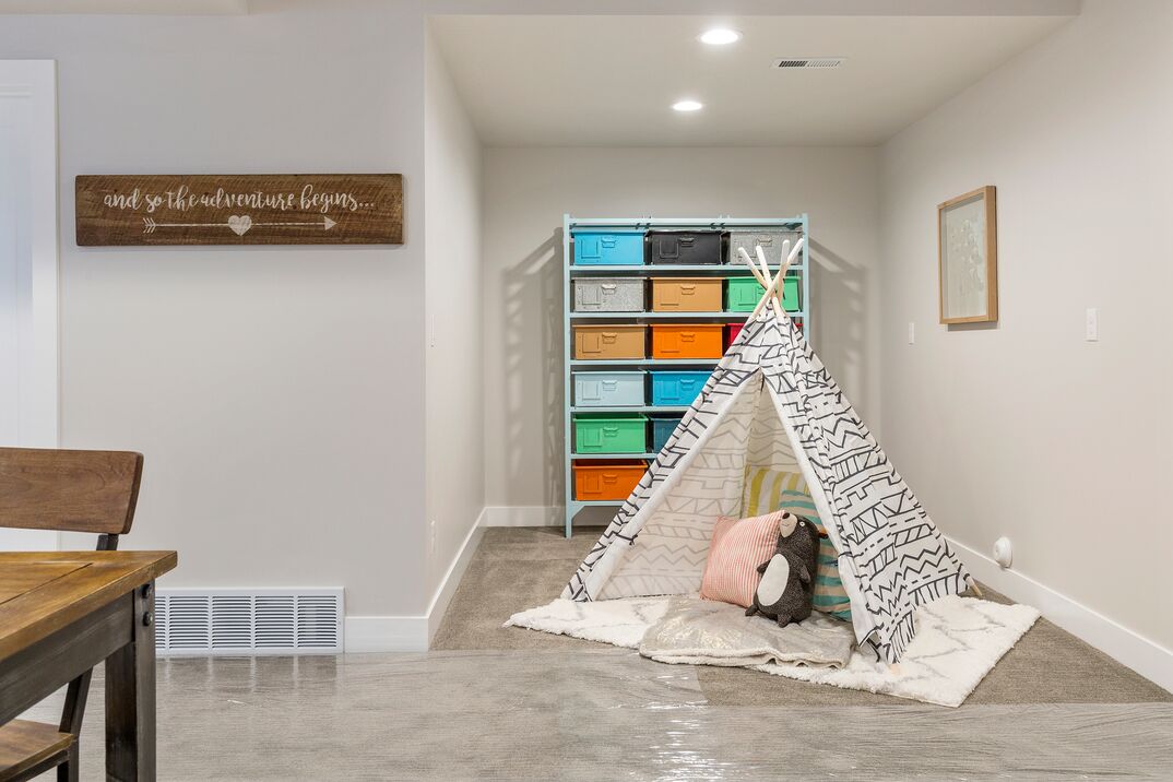 Wonderful playland for kids in basement of custom home