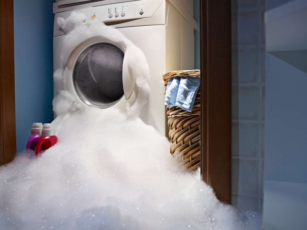 overflowing washing machine bubbles
