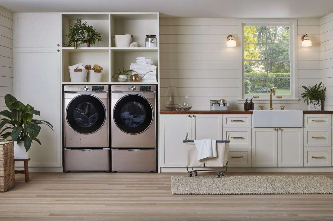 laundry room with side-by-side washer and dryer