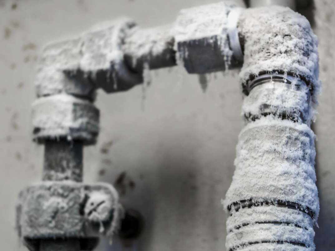 frozen pipe with icicles