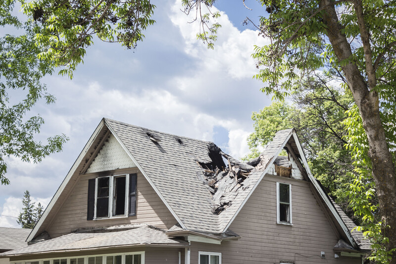 roof caved in on home damaged property