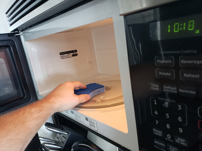 cleaning inside of microwave