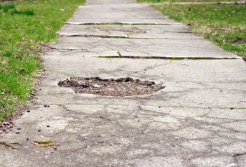 Pothole on the sidewalk