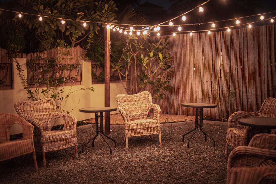 Cozy Backyard Patio Setup with string lights