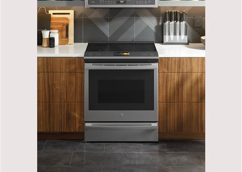 A stainless steel GE Profile smart range is displayed in a modern kitchen