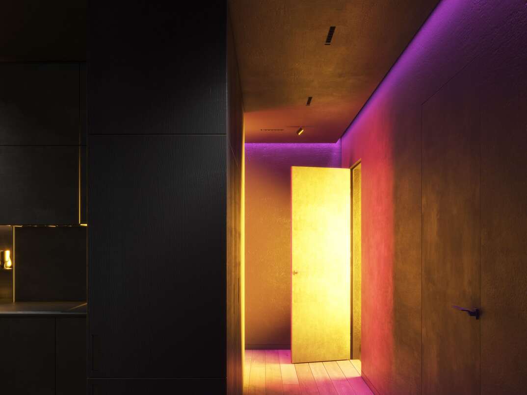 Multi-colored lighting in the corridor of the apartment 