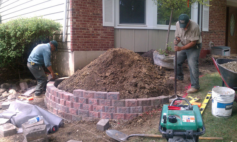 Retaining wall being built at the old Rossi house in the same area.