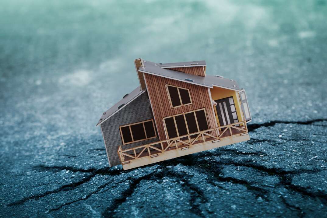 Earthquake crisis house risk insurance concept