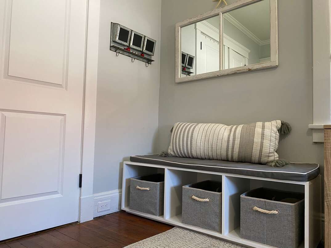 Mud  space  inside the home with storage bench