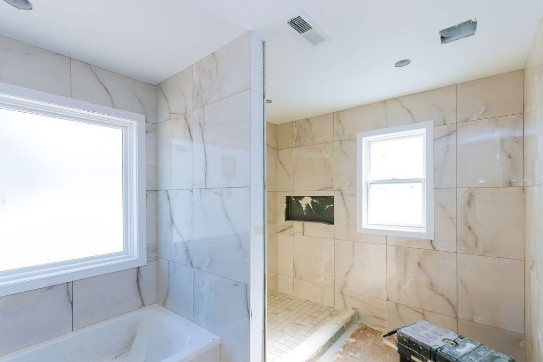 Bathroom unfinishing new apartments repair installation of interior tile finish