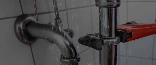 FIxing a leaky pipe.
