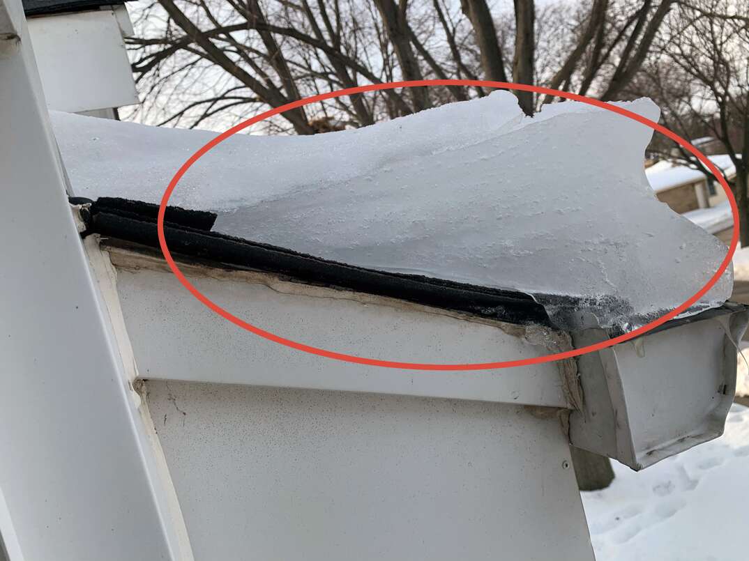 a picture perfect example of an ice dam on a residential roof