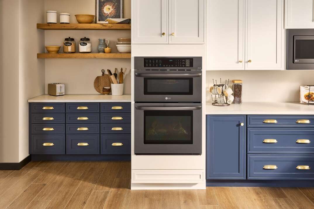 kitchen with blue cabinets and LG range