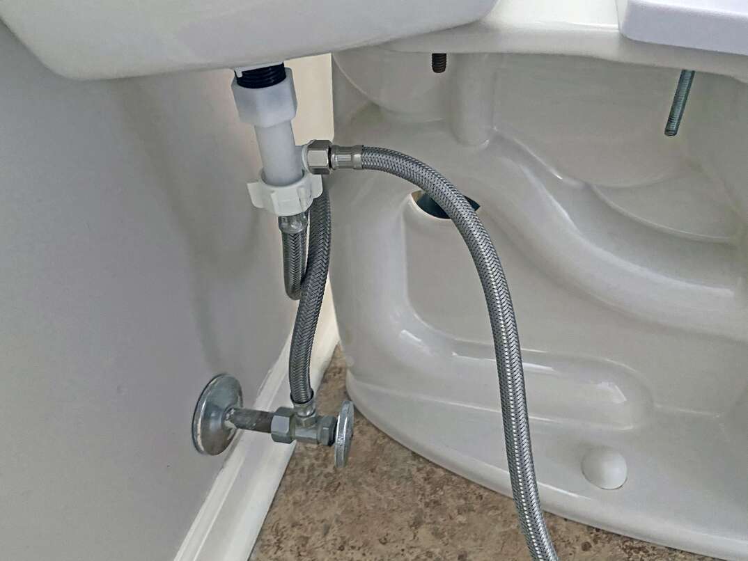 residential toilet water line with tee valve for aftermarket bidet attachment
