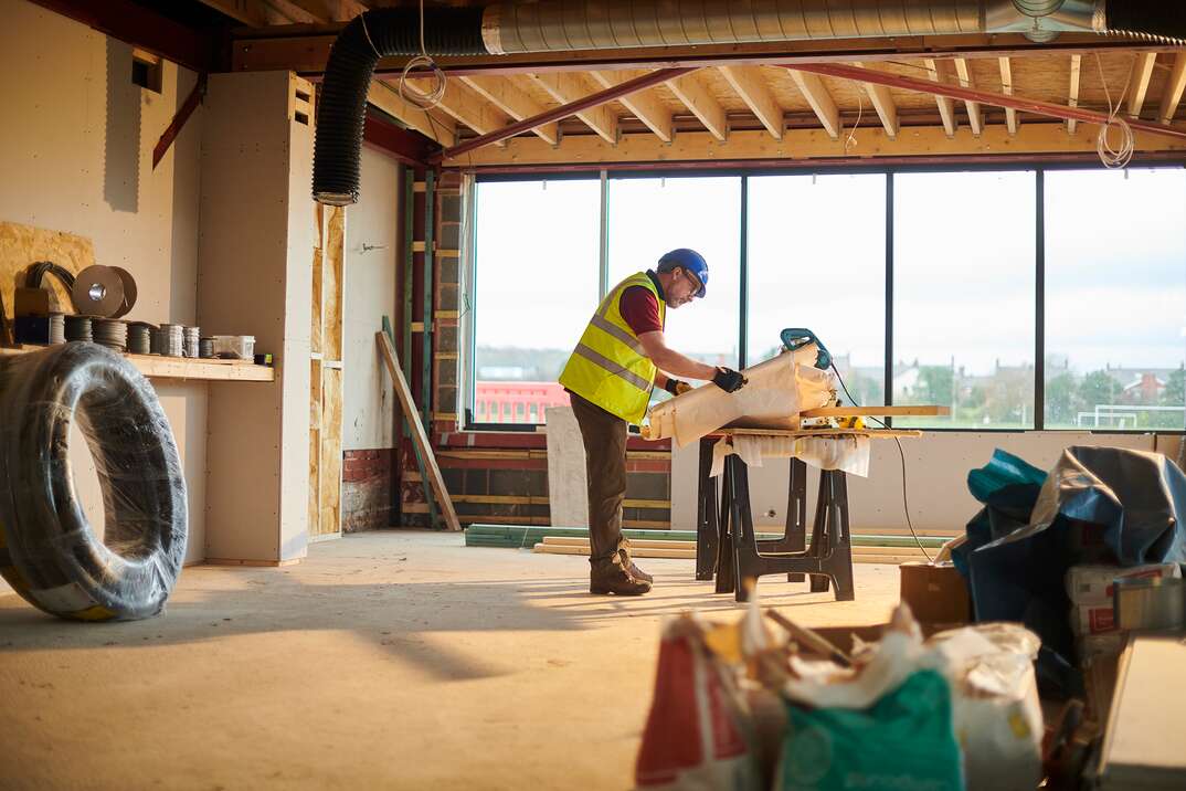 builder checking his plans