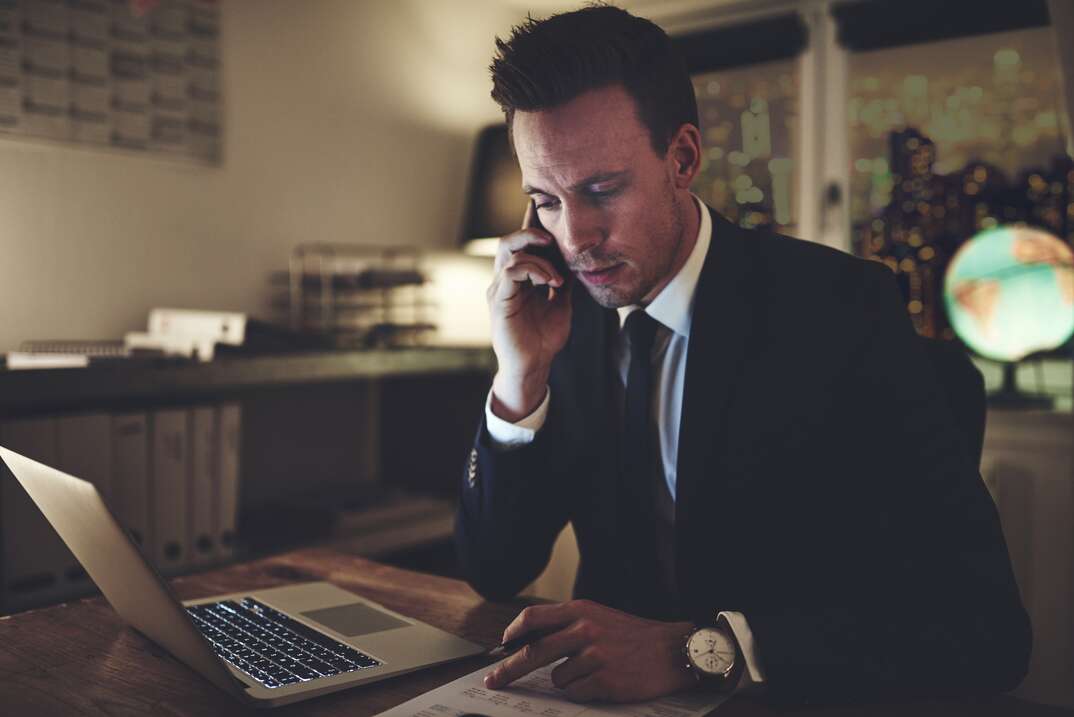 accountant talking phone during work