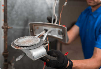 Technician working on an HVAC system