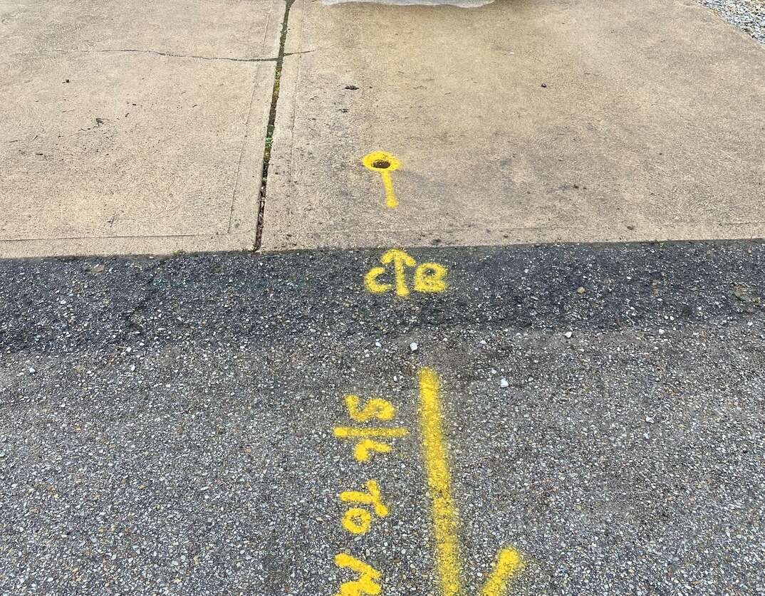 pavement marked for gas line