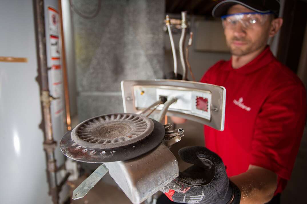 technician with water heater