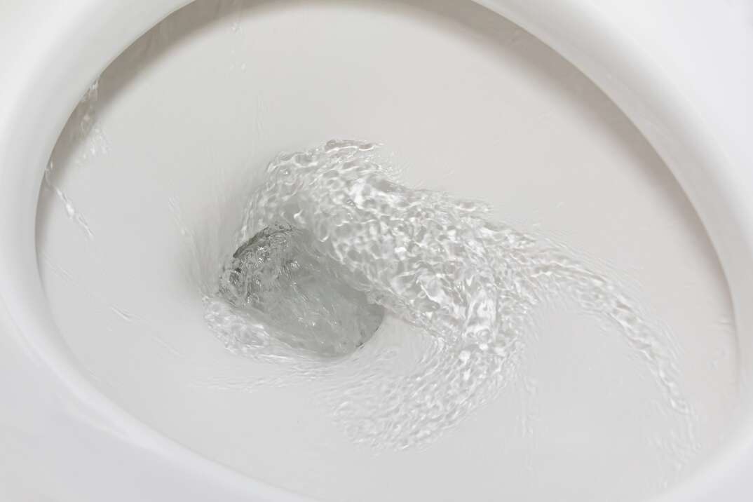 water flushing down toilet