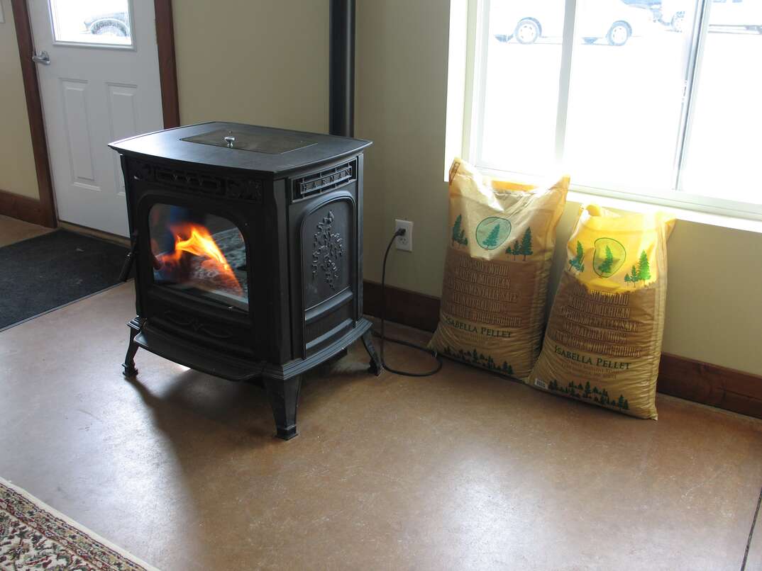 Wood pellet burning stove