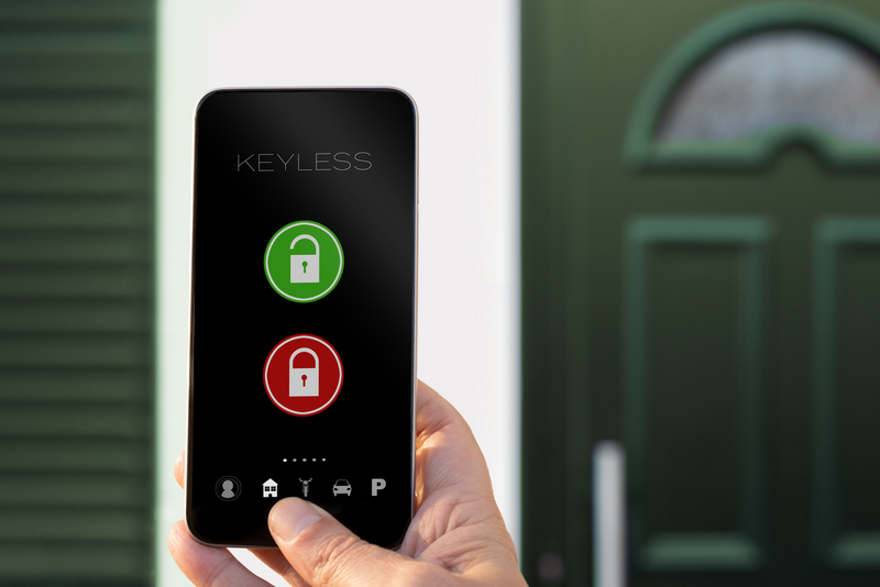 A human hand holds a smartphone in front of the front door of a house while using a connected system to unlock the door, smart lock, lock, smart, smart technology, human hand, hand holding smartphone, unlocking door, front door of house, house, home, front door, security, security system, smart security, cell phone, phone