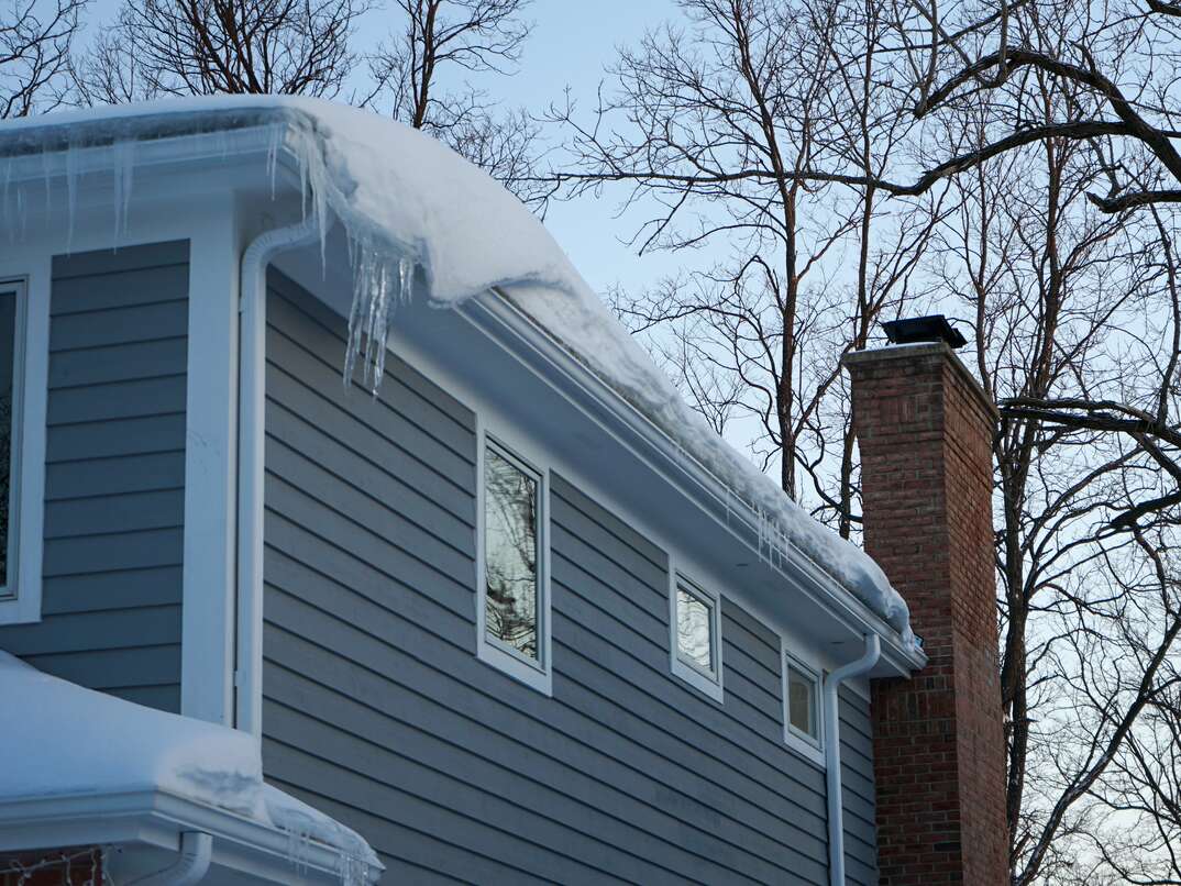 gutters covered in ice and snow