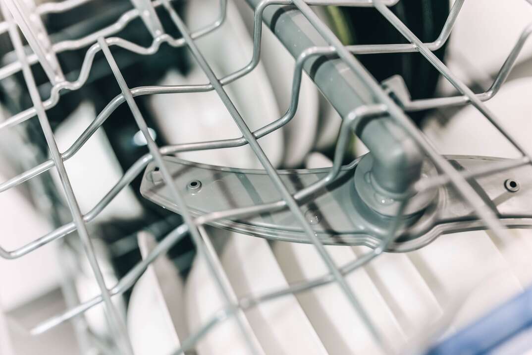 Dishwasher detail with water spray household appliances inside
